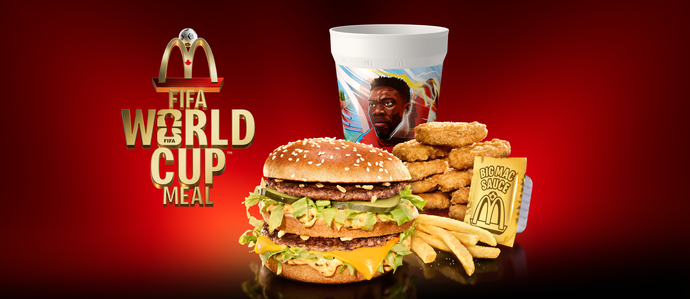 Big Mac, McNuggets®, drink and dip cup on red and black background with headline “FIFA World Cup™ Meal”