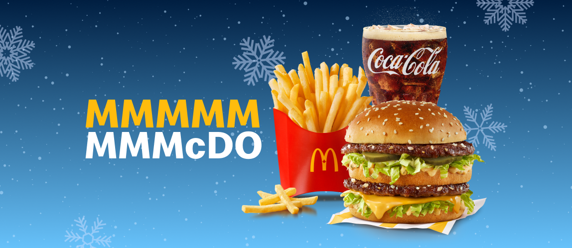Un Big Mac®, des frites et une boisson de fontaine sur un fond parsemé de flocons de neige.