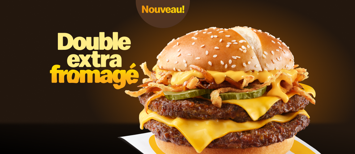 Le Double extra fromagé tout chaud à côté des mots « Nouveau! Double extra fromagé ».