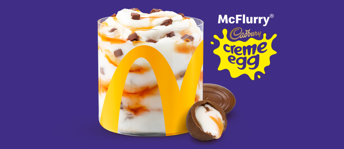 Headline: Les bâtons des étoiles de la LNHMD sont arrivés. La collection complète des sept bâtons des étoiles de la LNH dans leurs boîtiers, à côté d’un Big Mac, d’une portion de frites, format moyen, et d’une boisson de fontaine, format moyen.