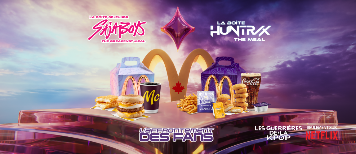 La Boîte-déjeuner Saja Boys et la Boîte HUNTR/X sont côte à côte, séparées par le logo L’affrontement des fans McDonald’s.