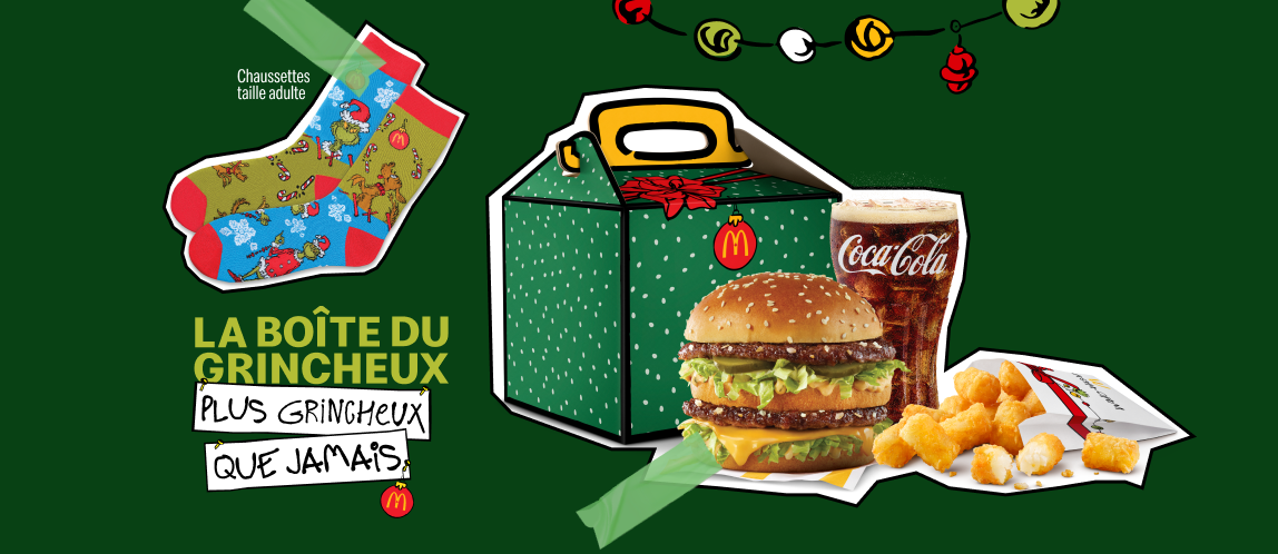 Images de la boîte du Grincheux, plus grincheux que jamais, d’un Big Mac®, d’une boisson de fontaine, de Bouchées de patate du Grincheux, d’une paire de chaussettes dépareillées, taille adulte, placées à côté des mots « La boîte du Grincheux plus grincheux que jamais ». 