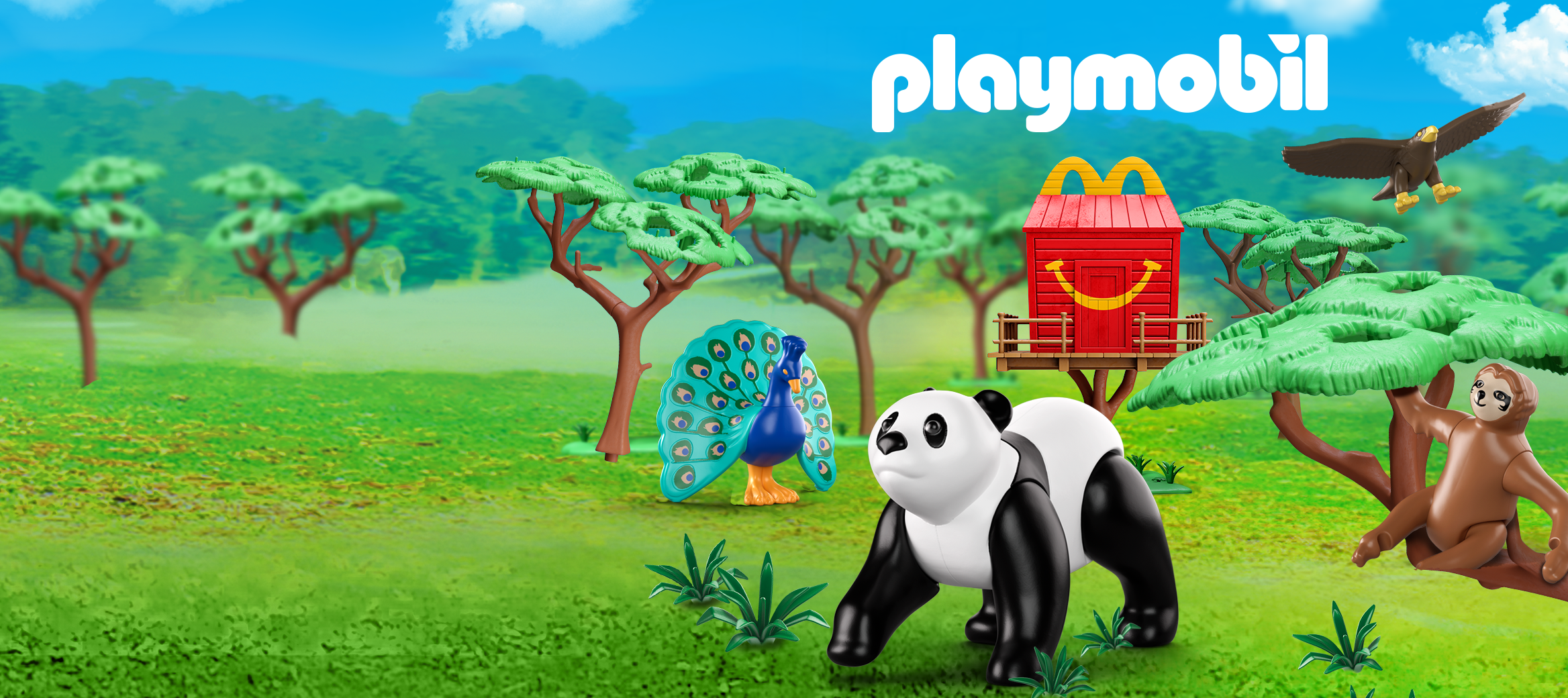 Une image statique avec un paysage de safari où une boîte Joyeux festin apparaît comme une cabane dans les arbres au centre. Un panda, un paon et un paresseux se trouvent au premier plan, tandis qu’un aigle survole la cabane Joyeux festin. Le logo PLAYMOBIL blanc est positionné au-dessus de la cabane Joyeux festin.   