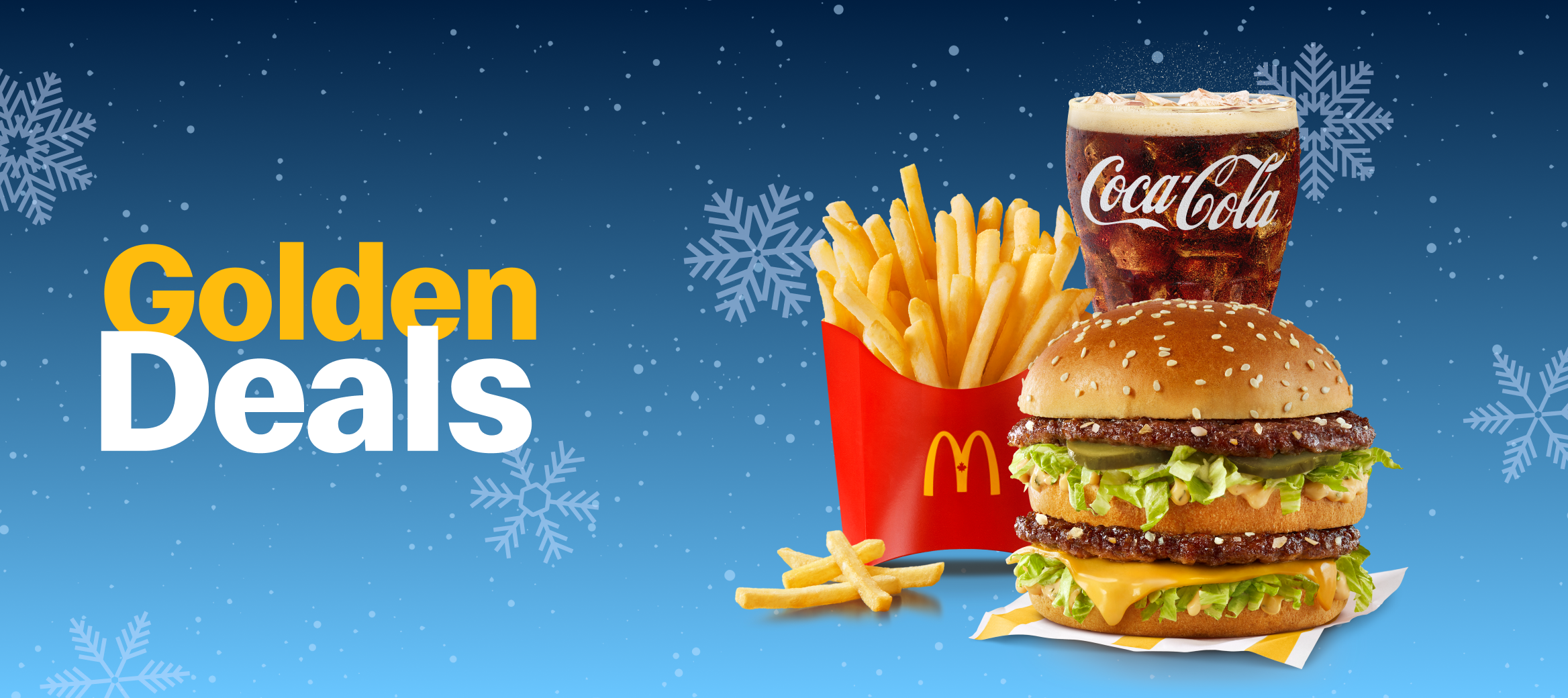 A Big Mac®, Fries, and Fountain Drink on a snowy background.