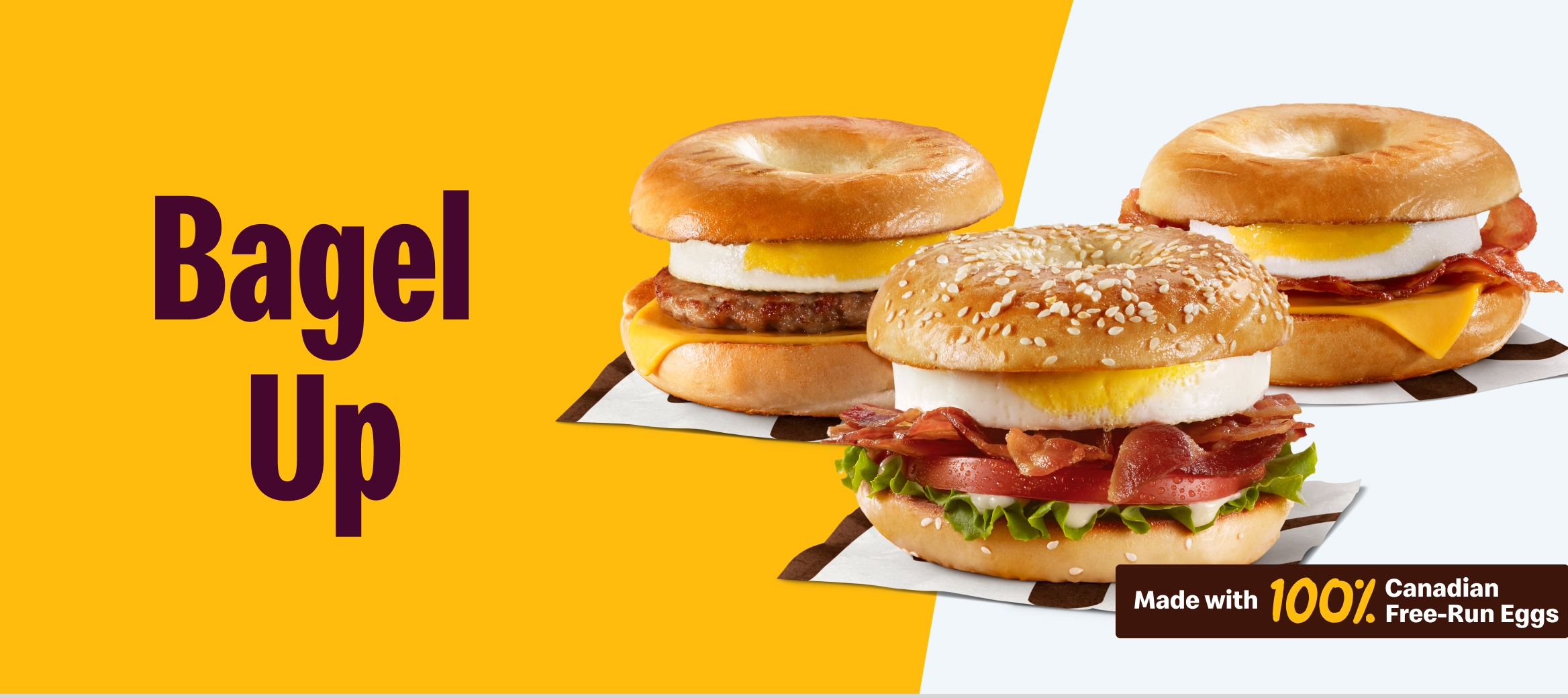 A McDonald's mobile carousel tile with a yellow background. Bold text reads "AN A.M FAVE" in the top left corner. Two Bagel Breakfast Sandwiches and a McCafé cup are displayed on the right. A badge in the bottom right reads "Made with 100% Canadian Free-Run Eggs."