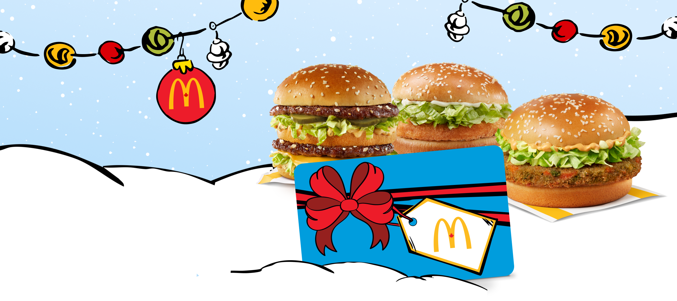 Big Mac, McChicken and McVeggie sandwich witha visual of the holiday gift card.