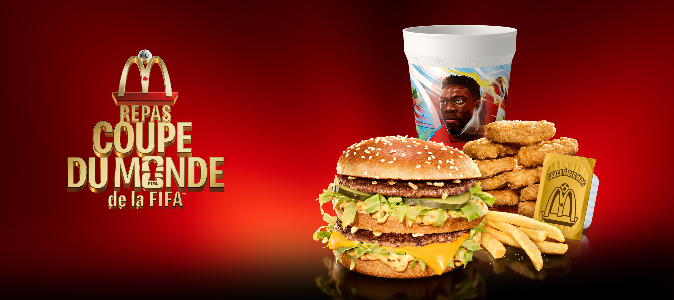 Un Big Mac®, des McCroquettesMD, une boisson et un contenant de sauce sur un fond rouge et noir ainsi que le titre « Repas Coupe du Monde de la FIFA™ ».