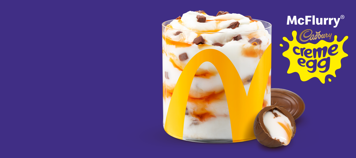 Headline: Les bâtons des étoiles de la LNHMD sont arrivés. La collection complète des sept bâtons des étoiles de la LNH dans leurs boîtiers, à côté d’un Big Mac, d’une portion de frites, format moyen, et d’une boisson de fontaine, format moyen.