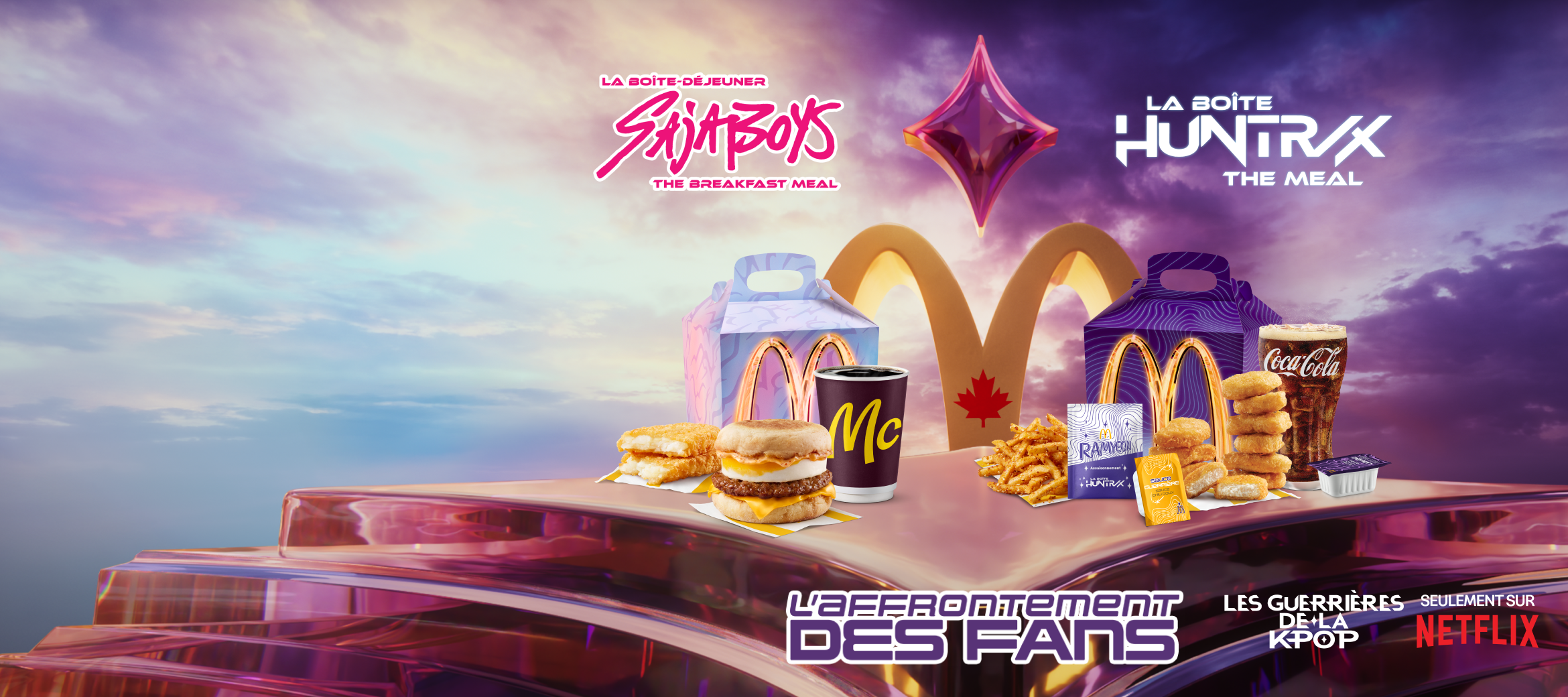 La Boîte-déjeuner Saja Boys et la Boîte HUNTR/X sont côte à côte, séparées par le logo L’affrontement des fans McDonald’s.