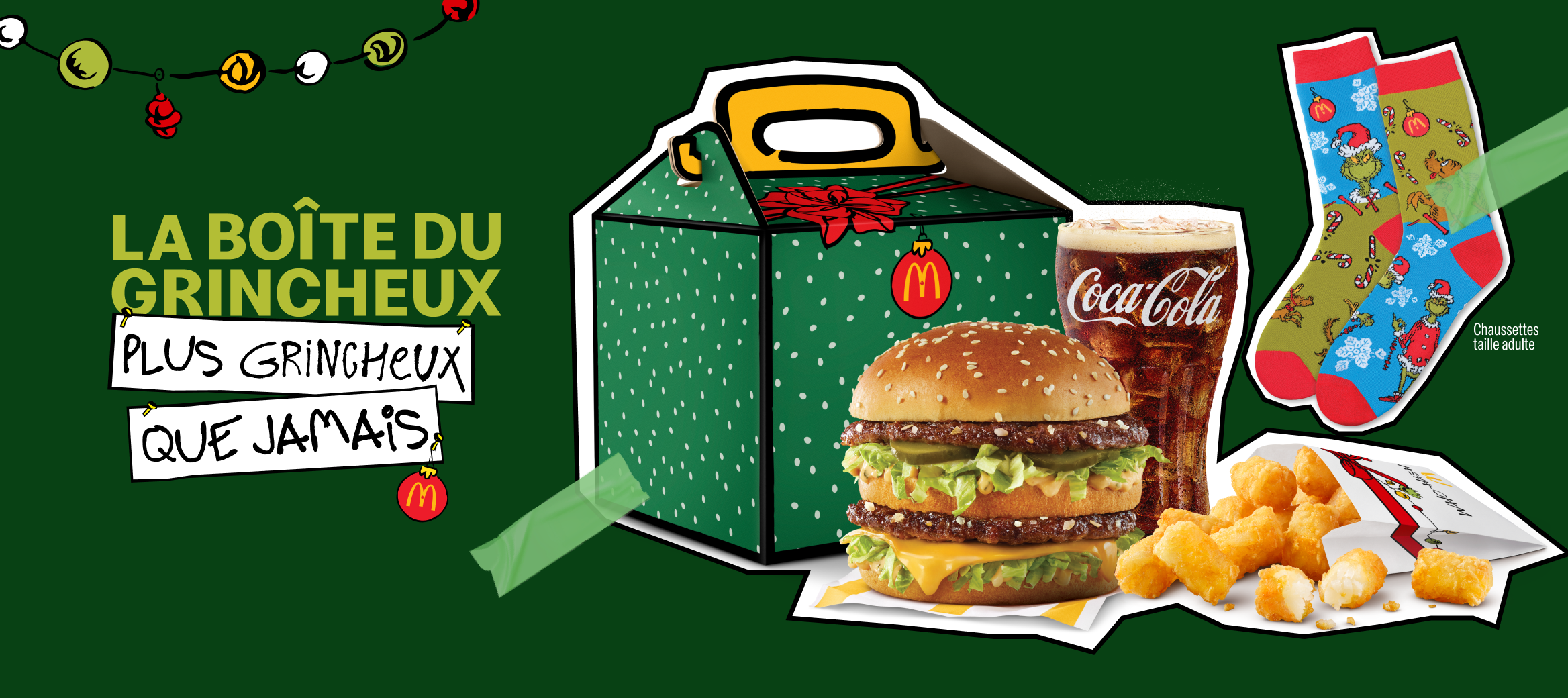 Images de la boîte du Grincheux, plus grincheux que jamais, d’un Big Mac®, d’une boisson de fontaine, de Bouchées de patate du Grincheux, d’une paire de chaussettes dépareillées, taille adulte, placées à côté des mots « La boîte du Grincheux plus grincheux que jamais ».