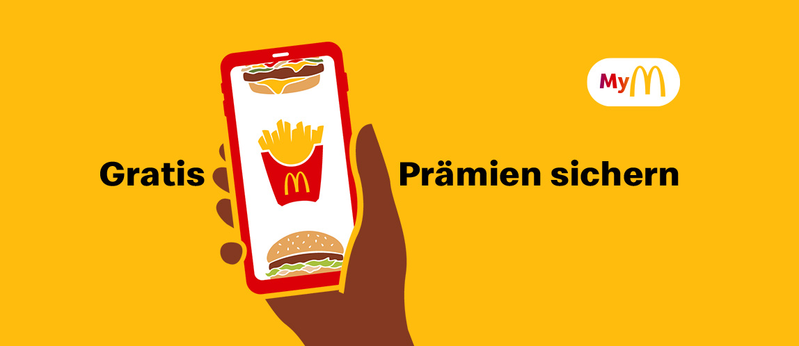 Im Vordergrund eine Hand, die ein Smartphone hält, auf dem die McDonald’s App geöffnet ist. Im Hintergrund der Hinweis zum Bonusprogramm MyMcDonald’s und der Aussage „Gratis Prämien sichern“.