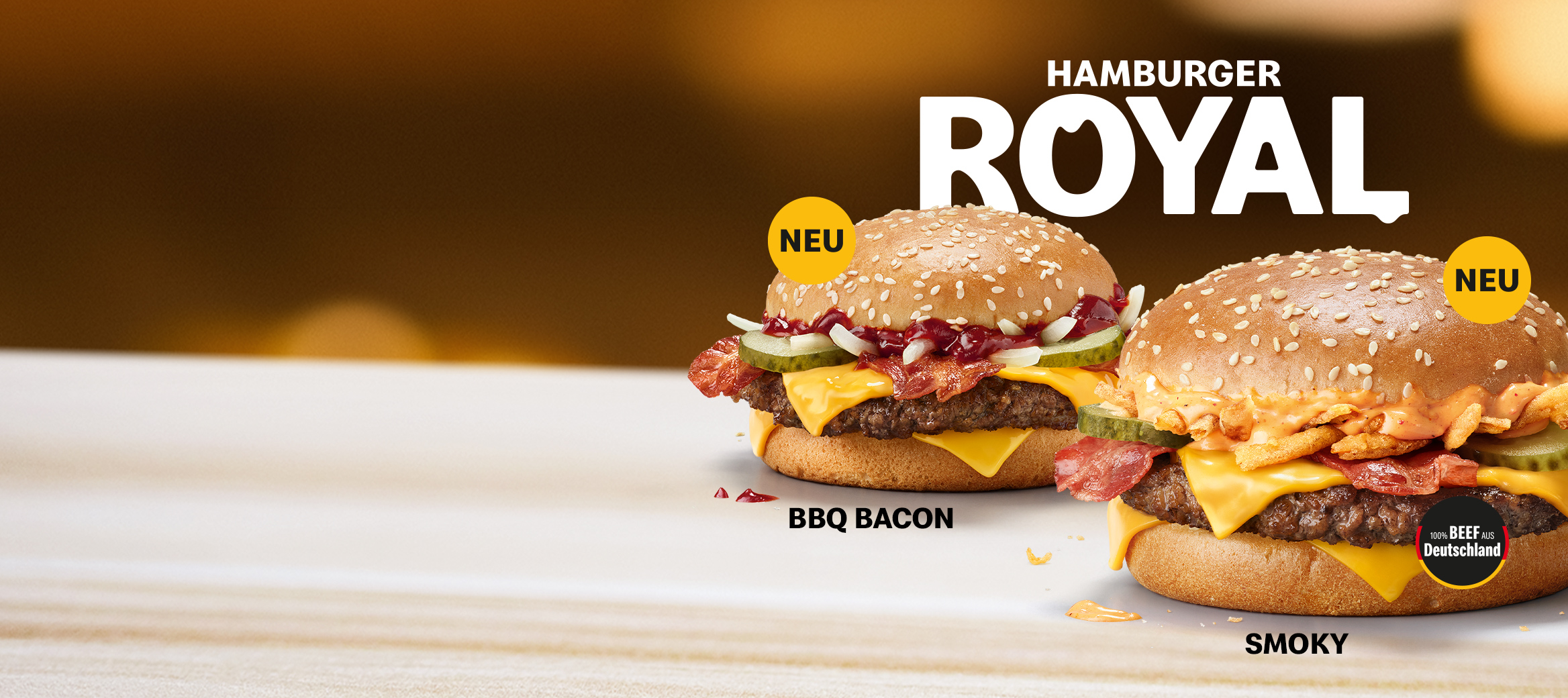 Der neue Hamburger Royal Smoky mit cremig-würziger Smoky Sauce und der neue Hamburger Royal BBQ Bacon mit herzhafter Western Sauce.