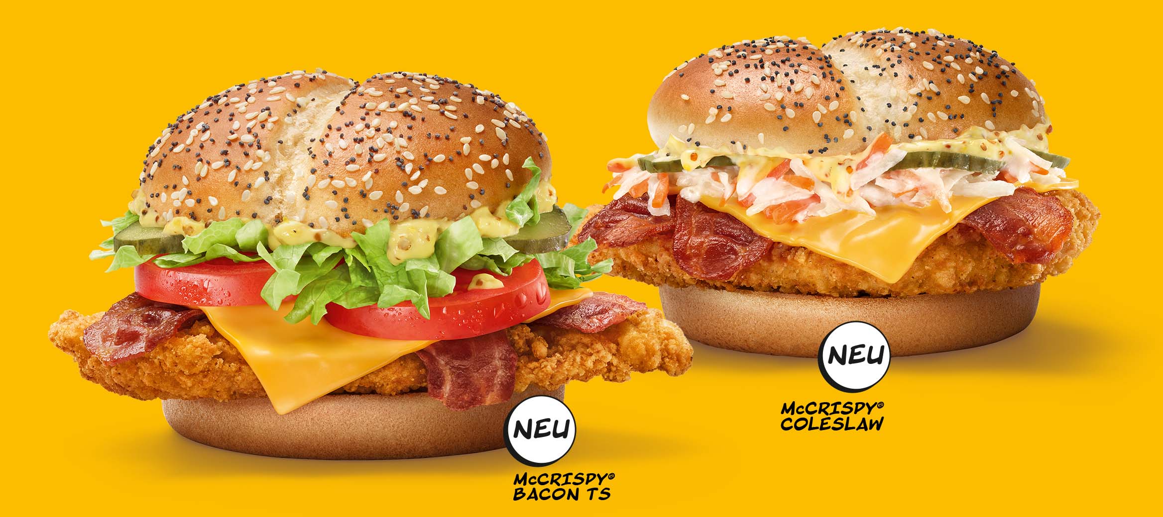 Bild zeigt den neuen McCrispy®: goldbraunes Bun und ein Hähnchenbrustfiletstück in Crispy-Panade.