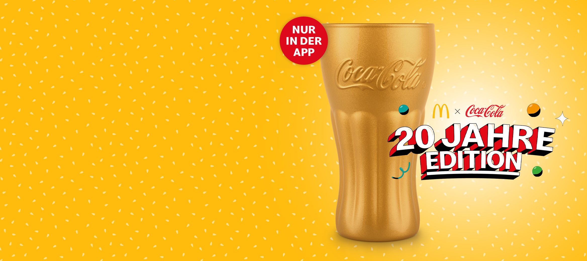 Abgebildet ist ein goldenes Coca-Cola® Glas der 20 Jahre Edition, welches nur in der App verfügbar ist. Überschrift: 20 Jahre Edition der Coca-Cola® Gläser.