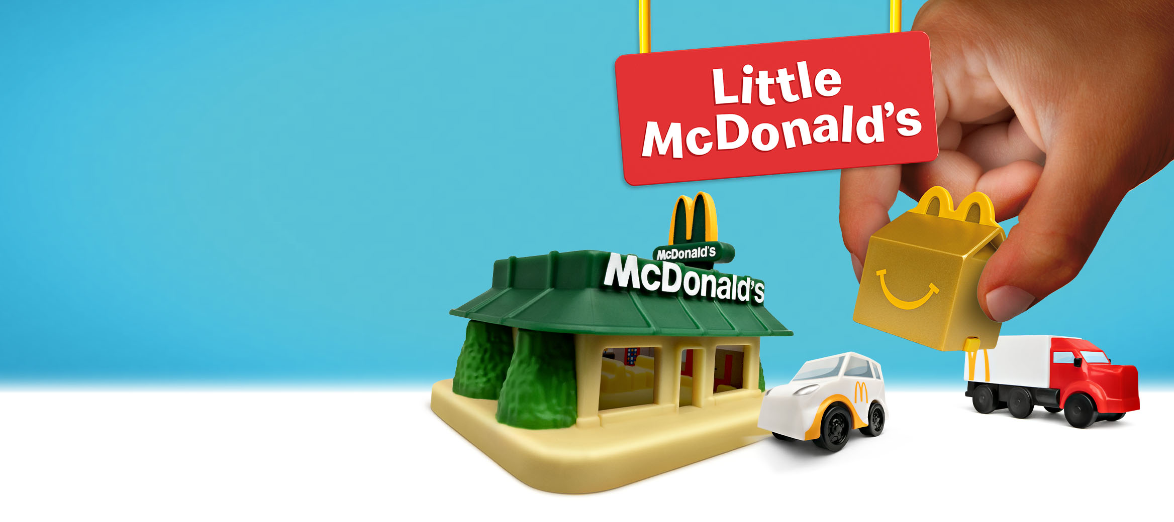 Little McDonald's Spielzeug-Set: Mini-Restaurant, Fahrzeuge, Happy Meal Box.