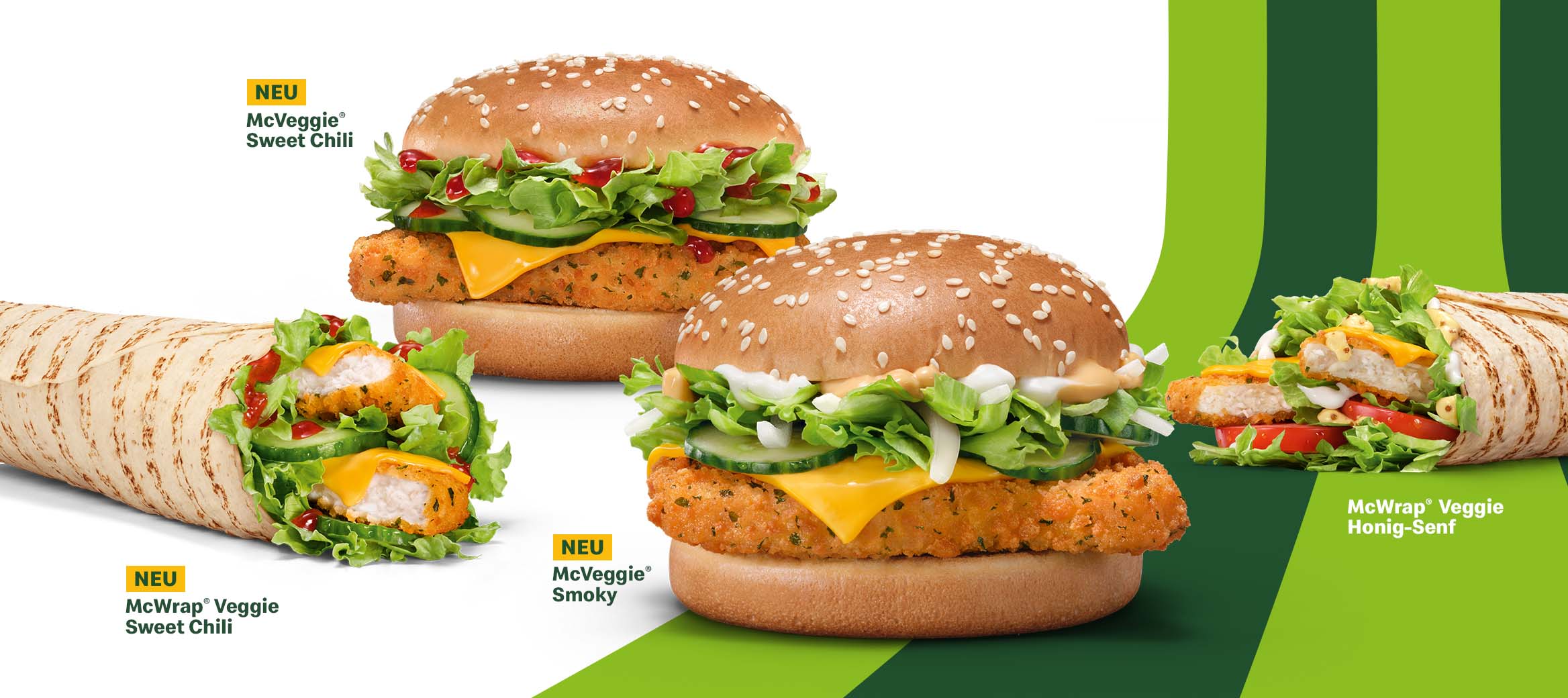 Grünes Aktionsbanner mit neuen Aktionsprodukten: Darauf arrangiert: McVeggie® Smoky, McVeggie® Sweet Chili, McWrap® Veggie Sweet Chili und ein McWrap® Veggie Honig-Senf.