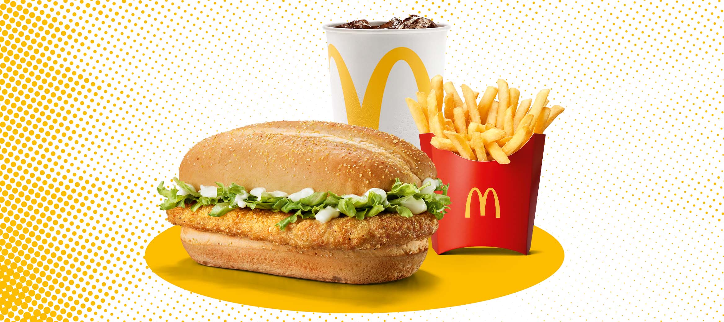 Zu sehen ist ein McChicken Classic mit mittleren Pommes und 0,4l Softdrink.