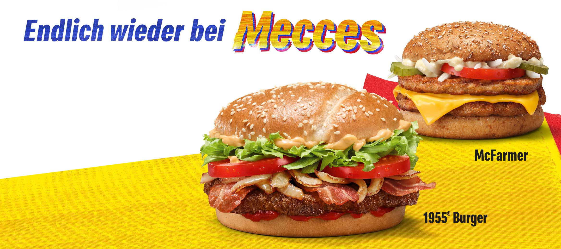 Endlich wieder bei Mecces: 1955® Burger mit Rindfleisch, Bacon und gedünsteten Zwiebeln im Vordergrund, dahinter der McFarmer mit Sausage-Patties aus 100% Schweinefleisch aus Deutschland.