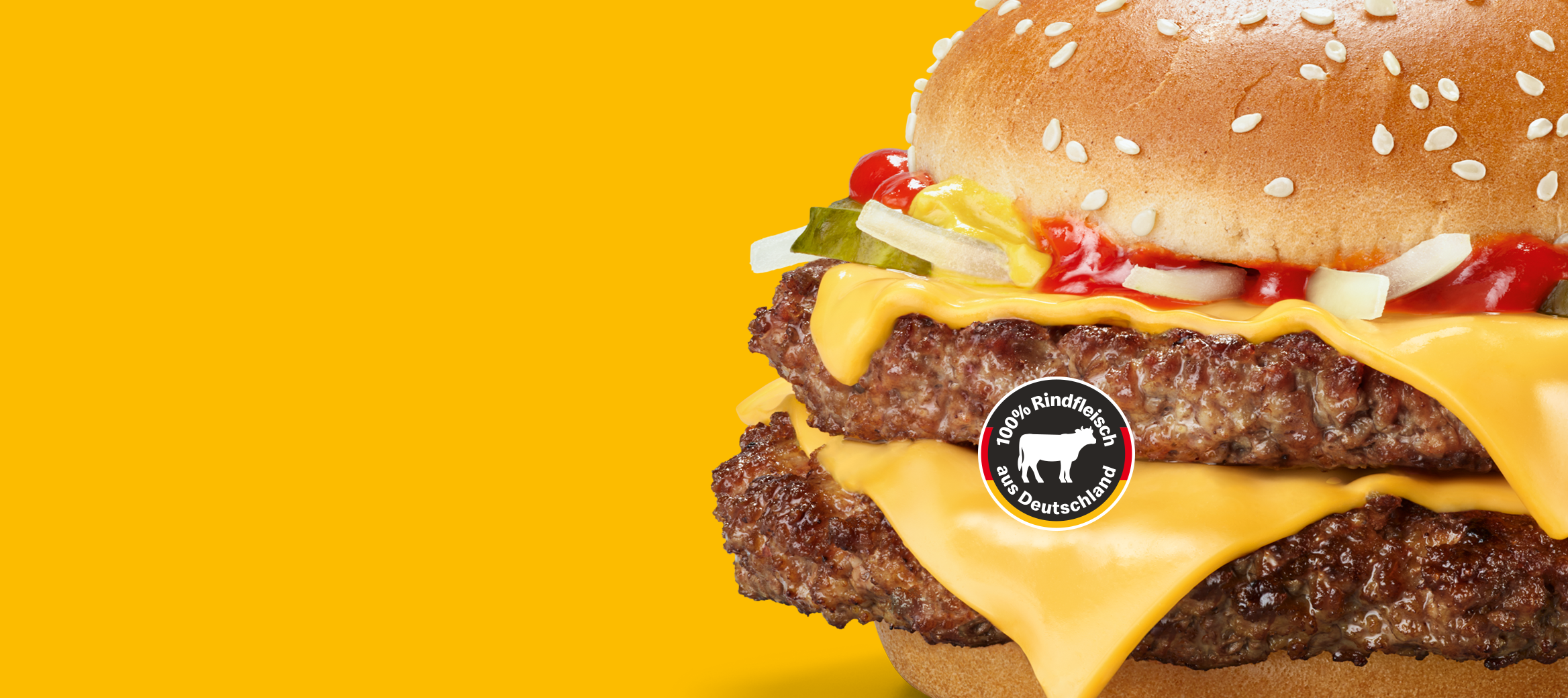 Double Hamburger Royal Cheese auf gelbem Hintergrund