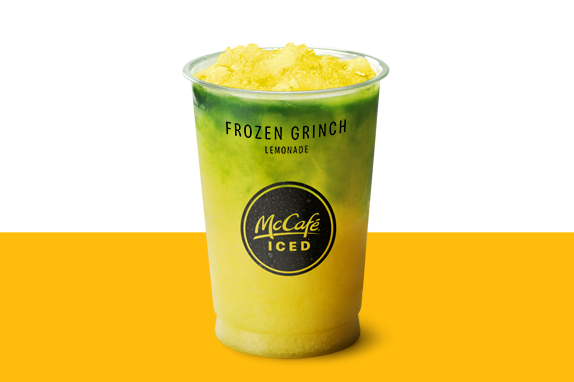Frozen Grinch Lemonade on a yellow shelf