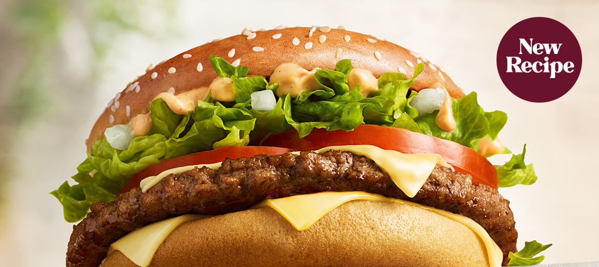 A McDonald’s burger with a brown background.
