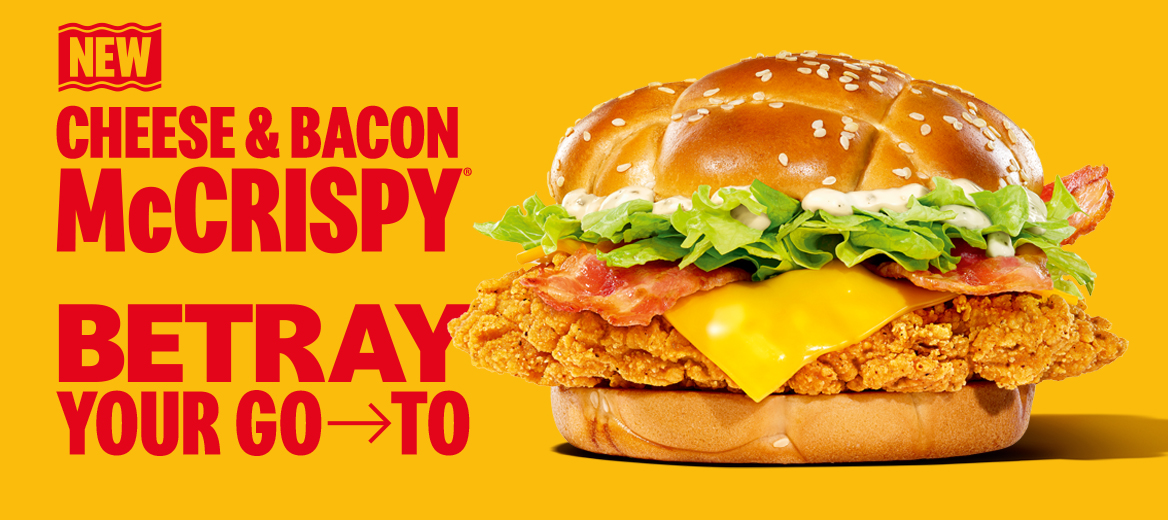 The cheese and bacon McCrispy on a plain yellow background with the line “Cheese and Bacon McCrispy. Betray your go-to” next to it.