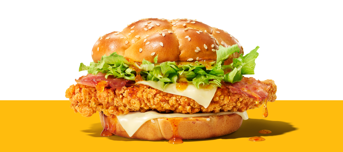 Hot Honey McCrispy chicken burger with bacon, lettuce, cheese and Hot Honey sauce.