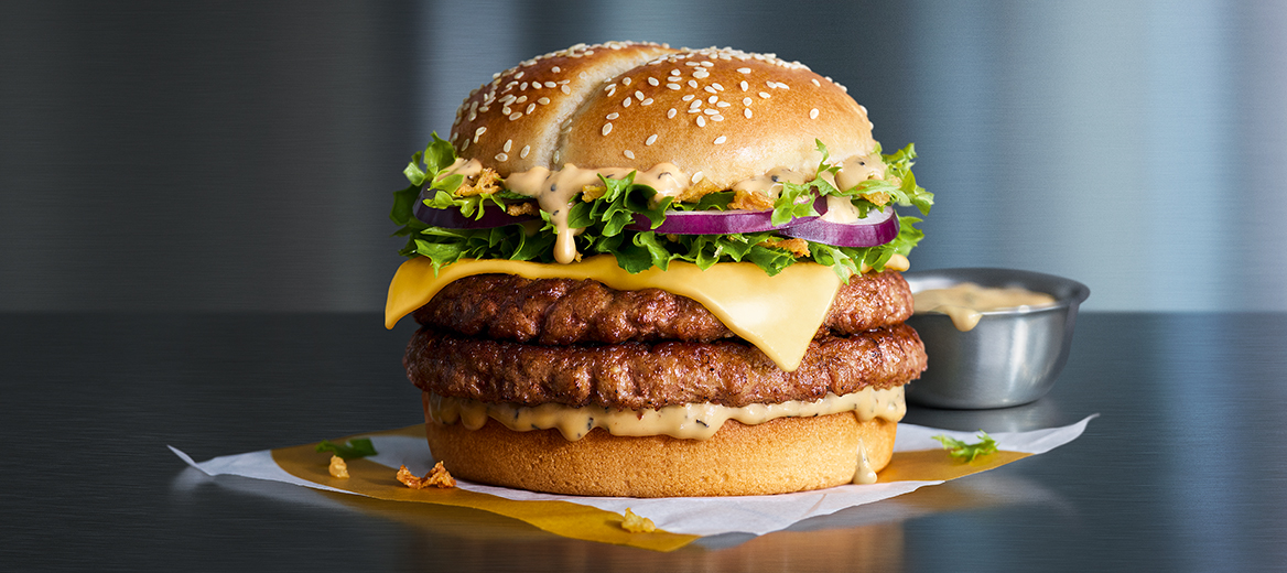 Steakhouse Stack on a dark grey shelf with a grey blue background 