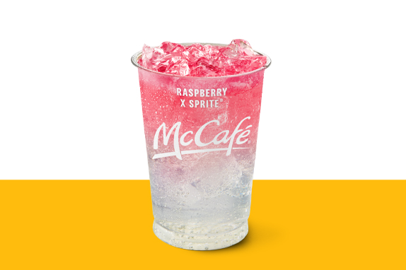 Rasperry and Sprite drink set against a yellow and white background