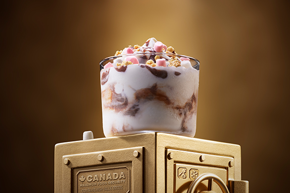 McDonald’s S'mores McFlurry® sits on top of a gold vault .