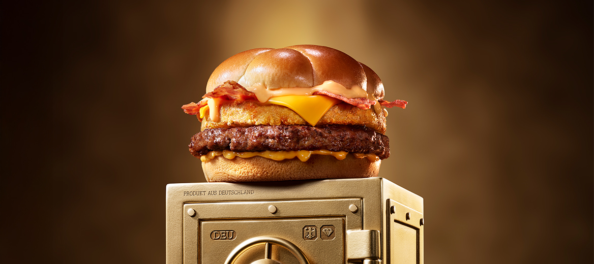 McDonald’s Big Rosti sits on top of a gold vault.