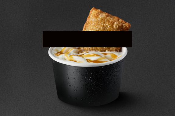 the McDonald’s Apple Pie Mini McFlurry® on a black background.