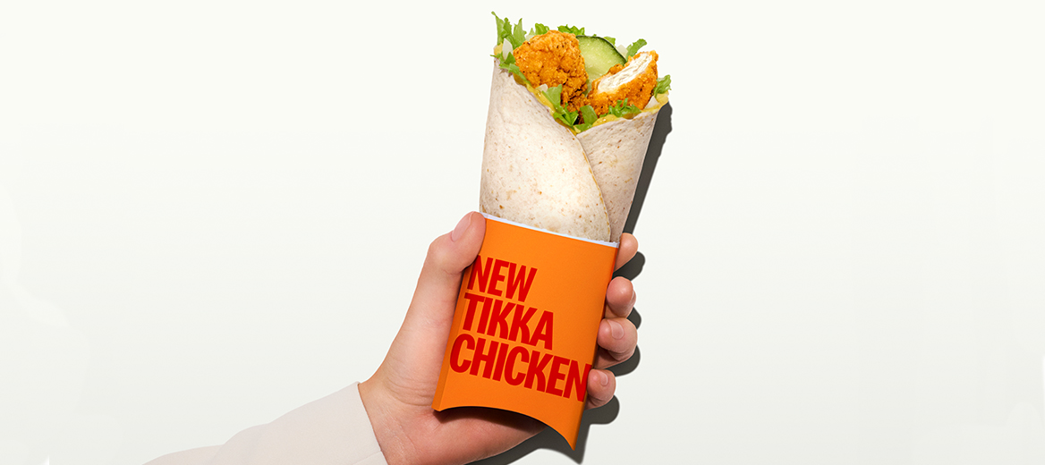 The Tikka Chicken wrap against a cream background.