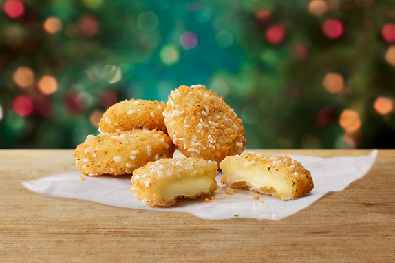 Cheese Melt Dippers on a table with a Christmas background.