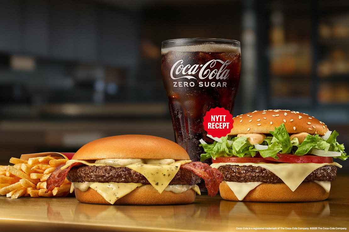Pepper & Bacon och Big Tasty tillsammans med ett glas Coca-Cola och pommes frites