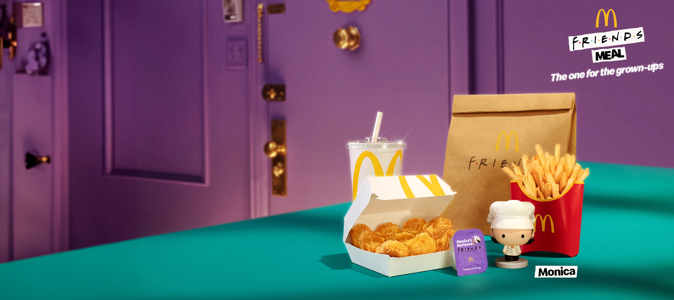 Friends and McDonalds Nuggets Meal on a teal countertop with the Friends purple door in the background.
