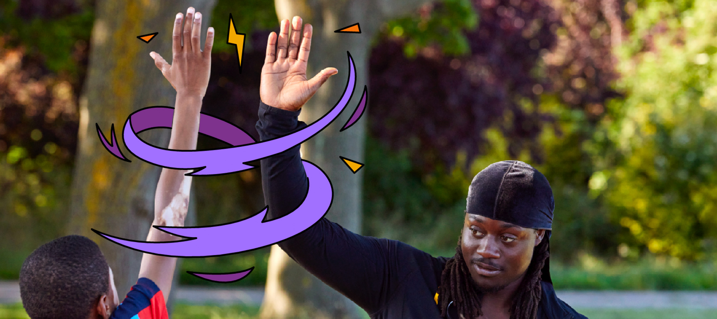 A group image including a child with his arms up, smiling and cheering, another child with a football in their arm and a final child smiling. This image also includes 3 smiling adults.