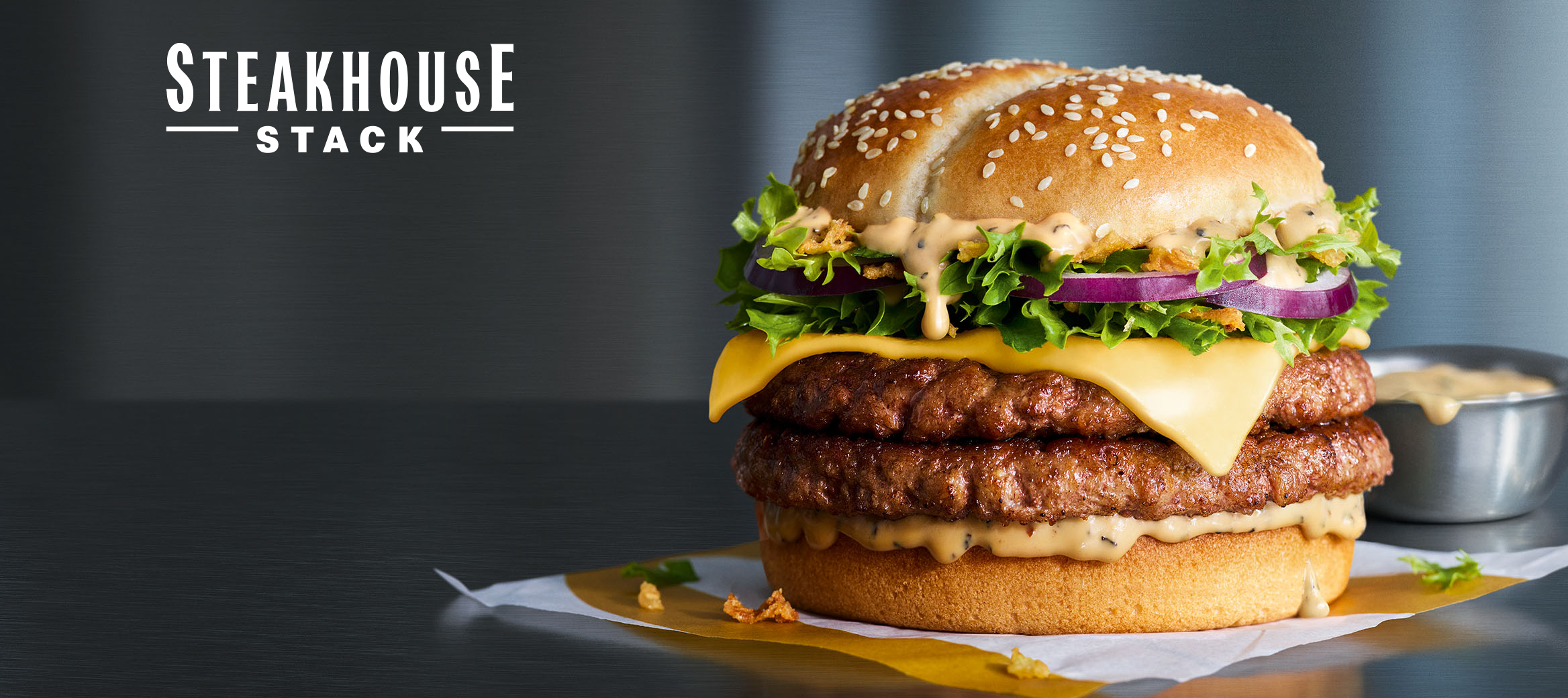 Steakhouse Stack burger on a blue background.