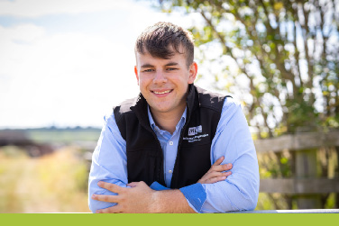 Young male farmer in a field