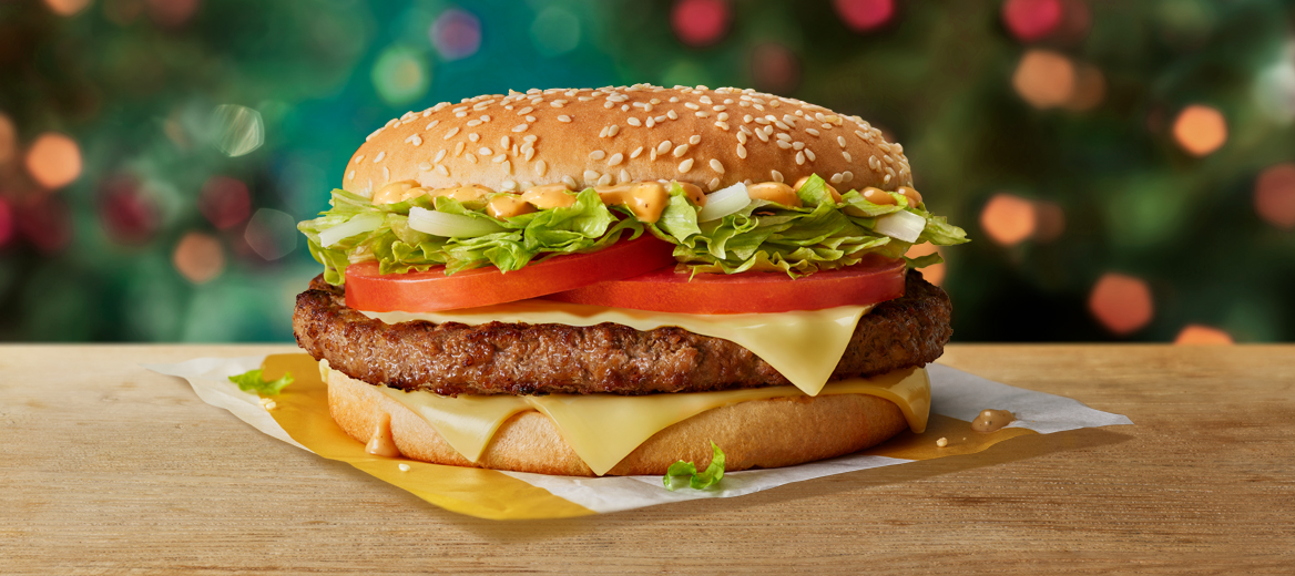 Big Tasty on a table with a Christmas background.
