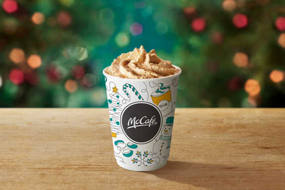 Caramel Waffle Latte on a table with a Christmas background. 