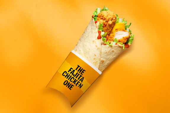 The Fajita Chicken One wrap against a yellow background.