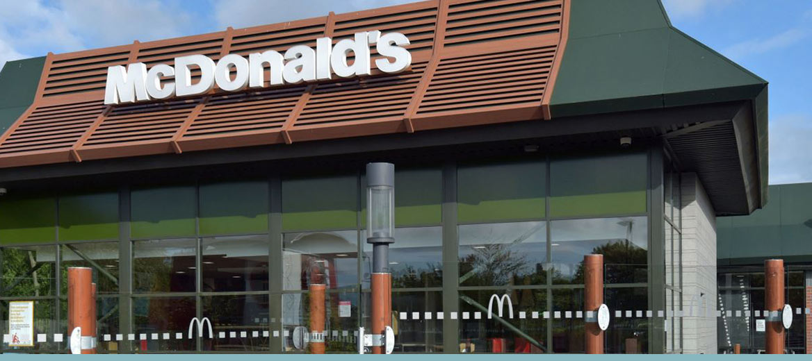 A shot of the exterior of a McDonald's restaurant. 