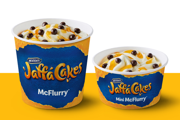 Regular and mini Jaffa Cakes McFlurry on a yellow shelf.