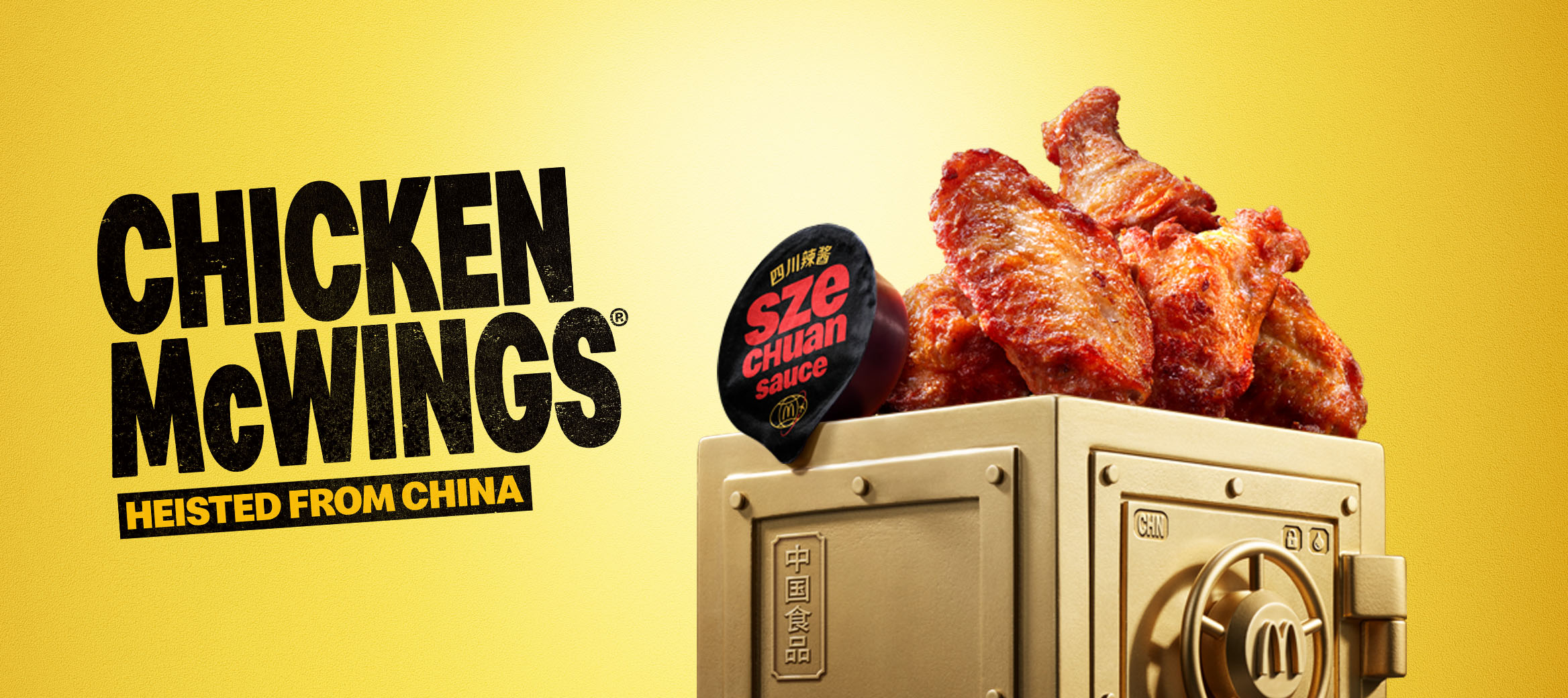 McDonald’s Chicken McWings® and Szechuan sauce sits on top of a gold vault.