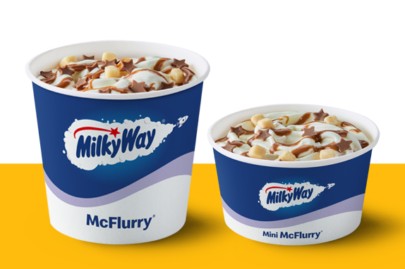 Regular and mini Milky Way McFlurry on a yellow shelf.
