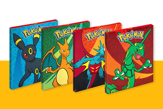Pokémon characters on a deck of cards on a yellow shelf