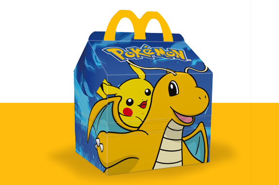 Minecraft creeper Happy Meal box on a yellow shelf