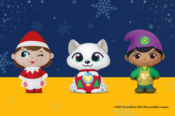 Three Elf Mates and Elf Pets toys on a yellow shelf and a snowy, blue background